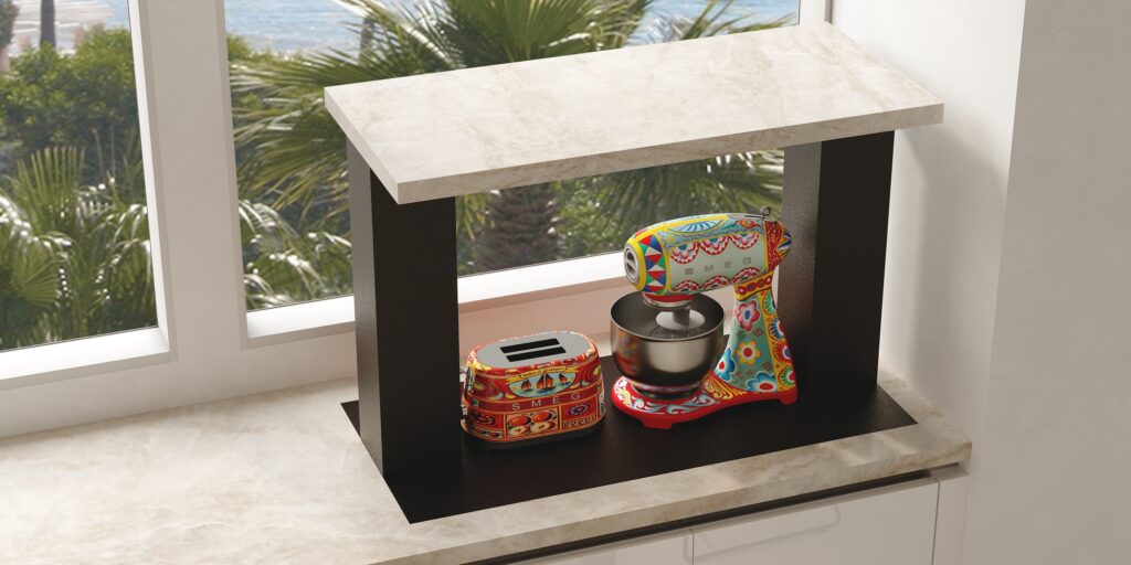 A small countertop shelf in front of a window holds a colorful stand mixer and toaster, both with intricate designs. The window shows a view of palm trees outside. Nearby, kitchen cabinets are fully utilized for hidden storage, ensuring all essentials are neatly tucked away.