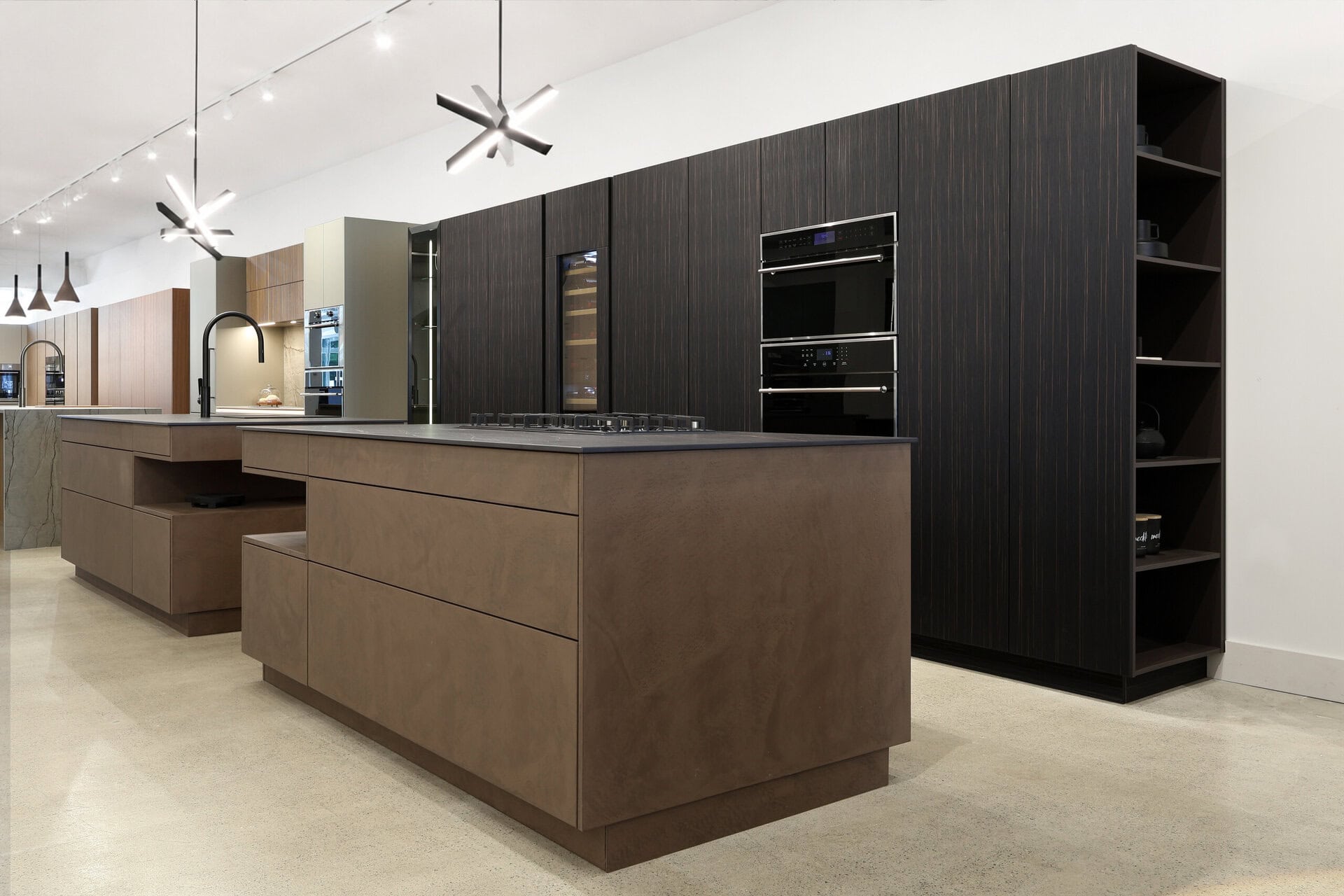 Bauformat kitchen display — chocolate concrete, textured ebony