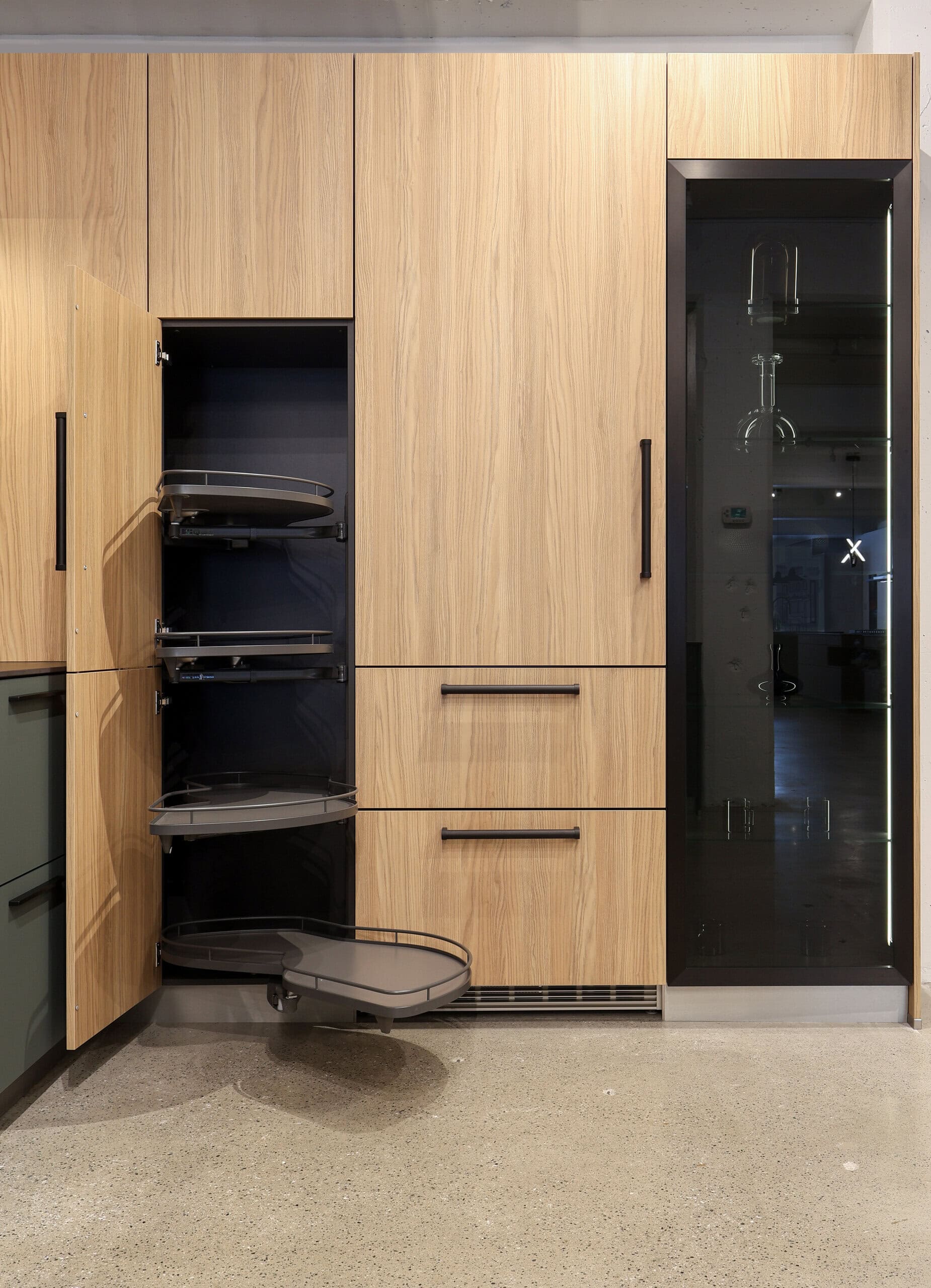 Bauformat kitchen display — lift-up ribbed larder, opened
