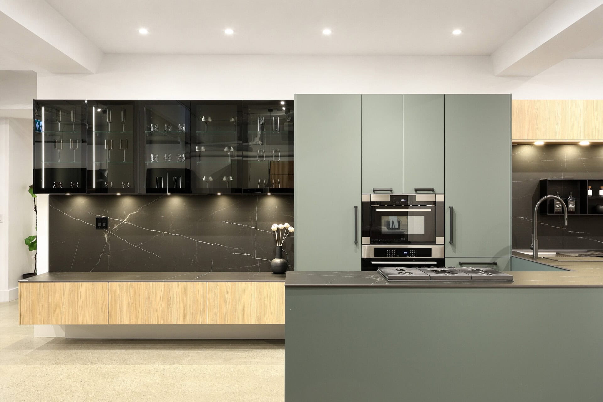 Bauformat kitchen display — island with lit glass display