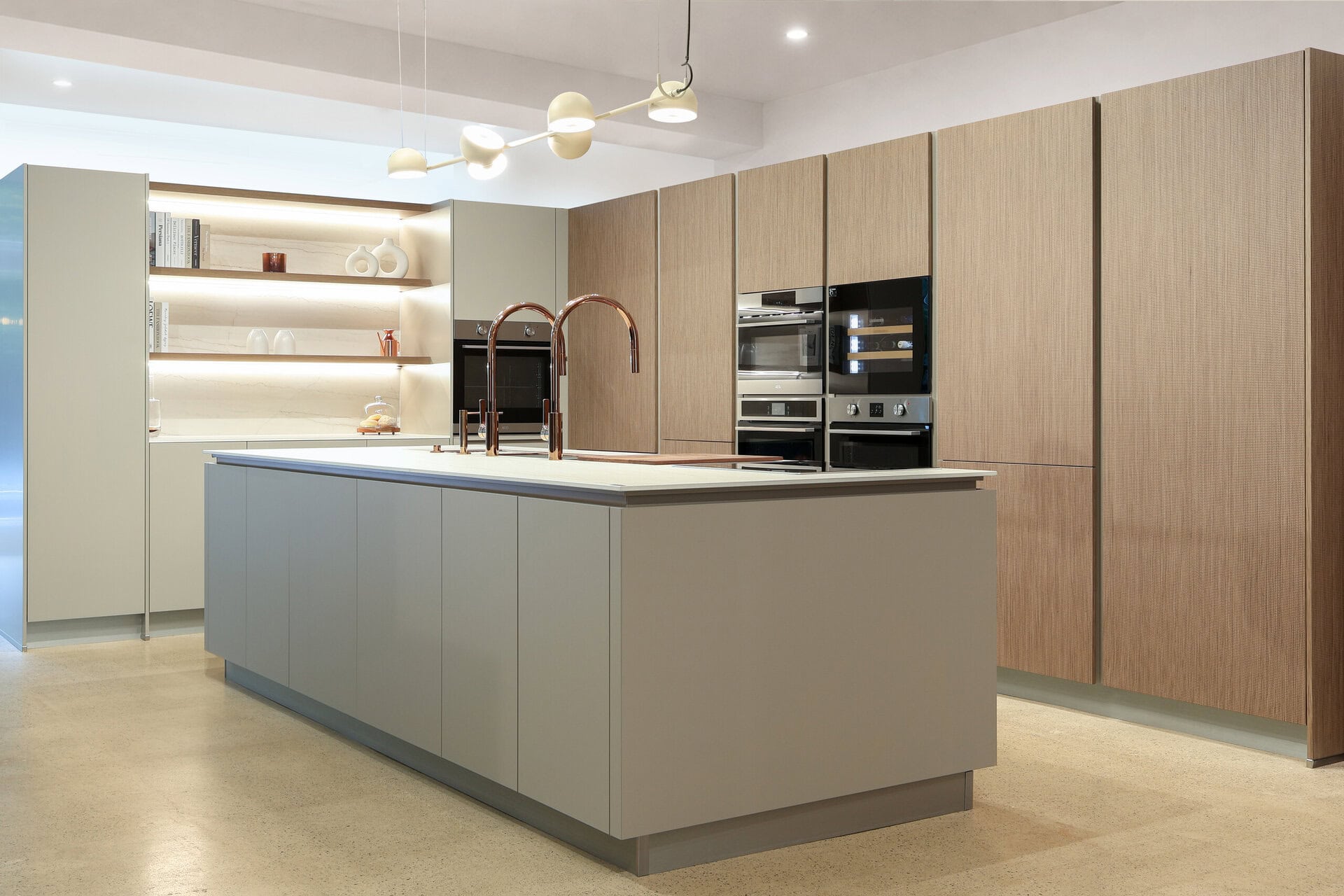Bauformat kitchen display — warm wood with lit open shelving